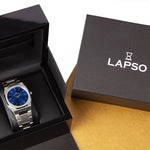 Reloj plateado con 2 manecillas y dial azul