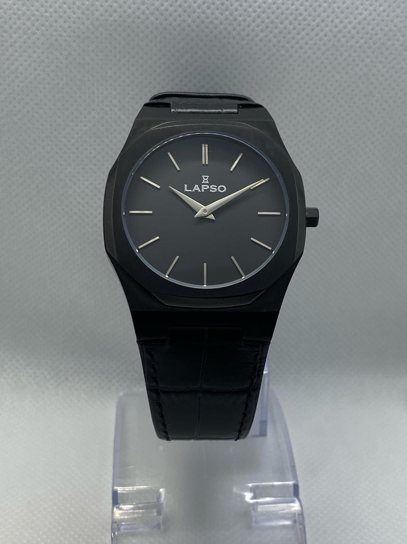 Reloj Negro con 2 manecillas plateadas y dial negro - Correa de piel negra